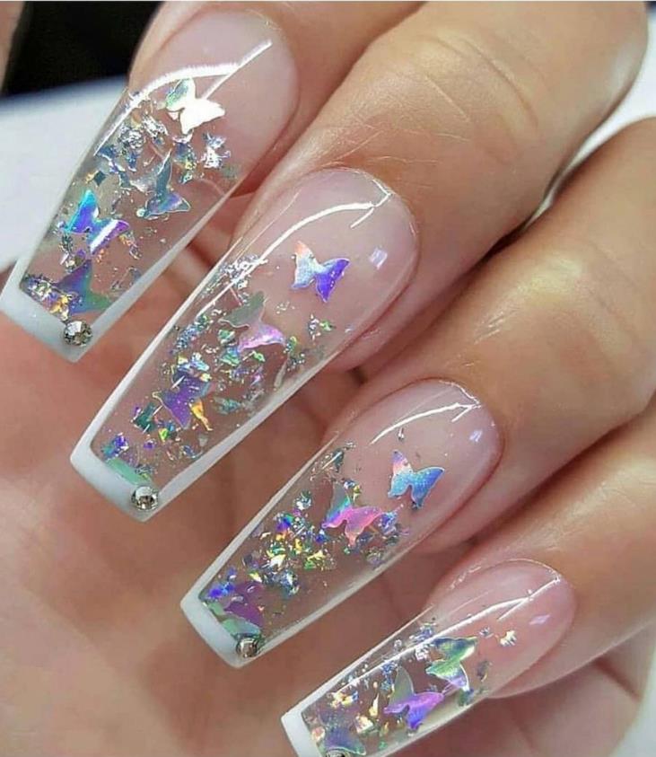 Pink butterfly nails with ballerina nail shapes