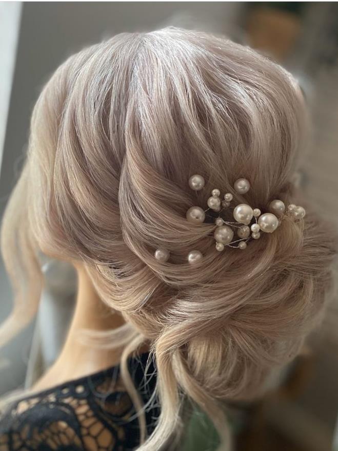 Bud-like Bridesmaid hairstyle for wedding woman