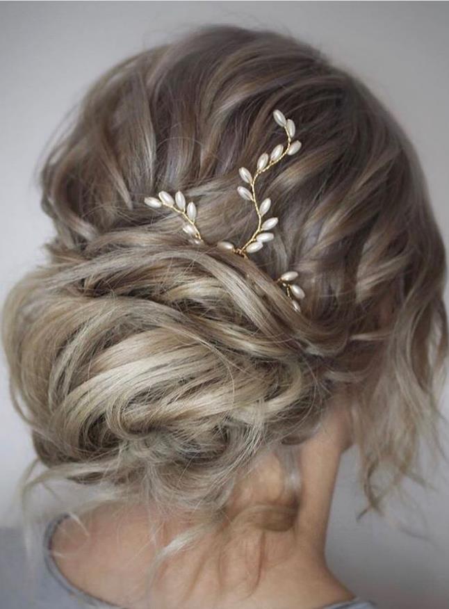 Bud-like Bridesmaid hairstyle for wedding woman